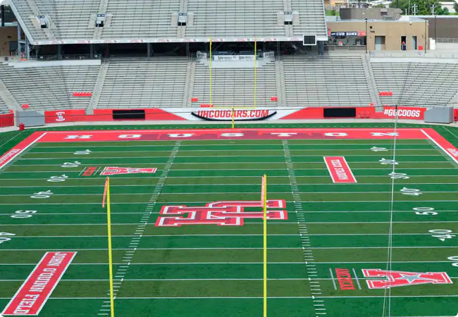 Sports stadium field with red and white markings